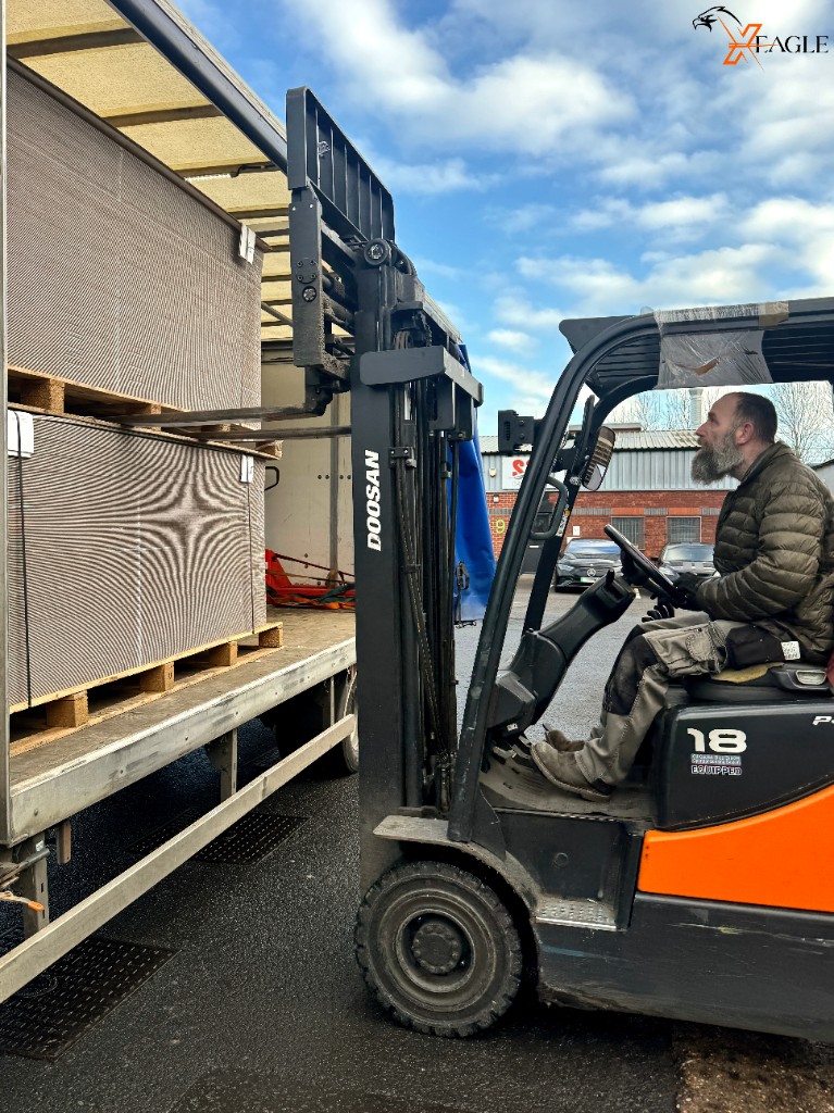 Forklift handling pallet
